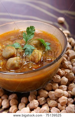 Indian Spicy Chana Masala, Raw Chickpeas Around Bowl