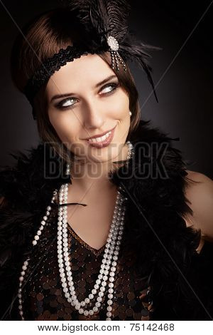 Beautiful retro woman in 20s style party outfit