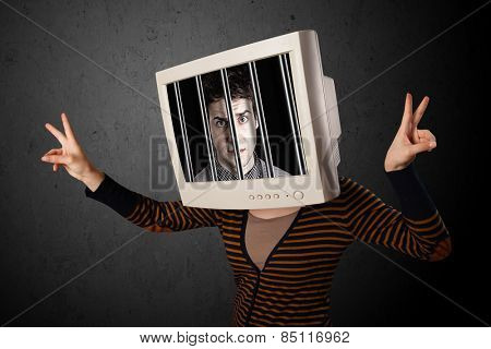 Business man with monitor screen on his head traped into a digital system concept