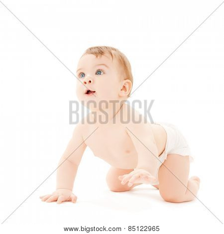 bright picture of crawling curious baby over white backgroubd