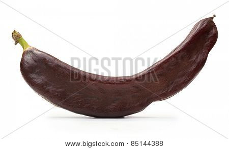 Carob pod  isolated on a white background