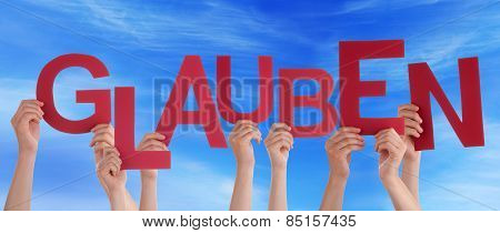 People Holding German Word Glauben Means Believe Blue Sky