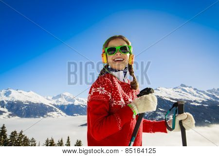 Winter vacation, snow, skier - girl enjoying winter