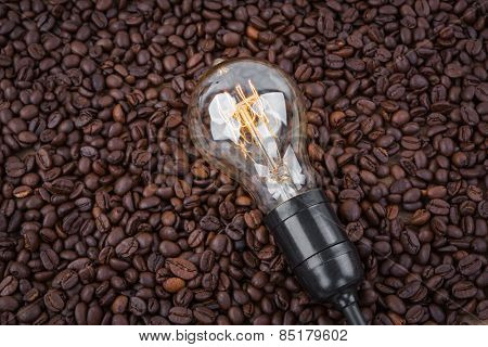 Light bulb on  coffee beans