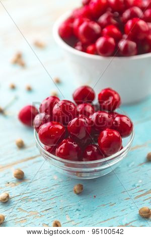 Sweet Cherry In Bowl On Rustic Table