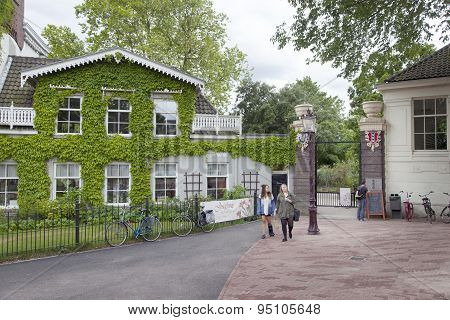 Tourists At The Entrance To Amsterdam Botanical Gardens