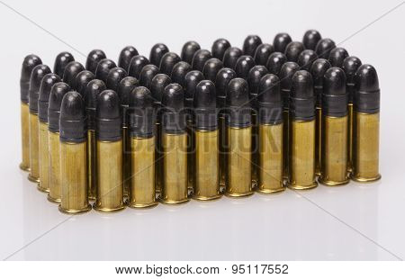 Cartridges 5.6 caliber on a white background