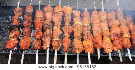 Shashlick laying on the grill closeup