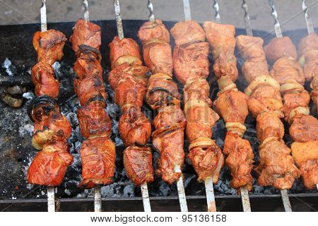 Shashlick laying on the grill closeup