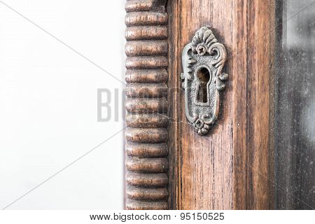 Keyhole of antique wooden cabinet