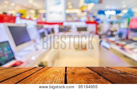 Blur Image Of Eletronic Department Store For Background Usage