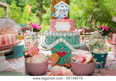 Prepared birthday table with sweets for children party