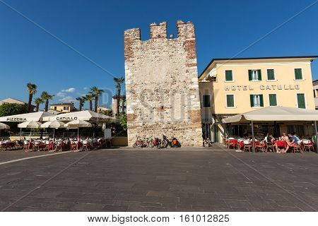 PADUA, ITALY - MAY 3, 2016: Bardolino attractive old town on the Veronese shore of Lake Garda. Its downtown is lined with shops bars restaurants and pizzerias.