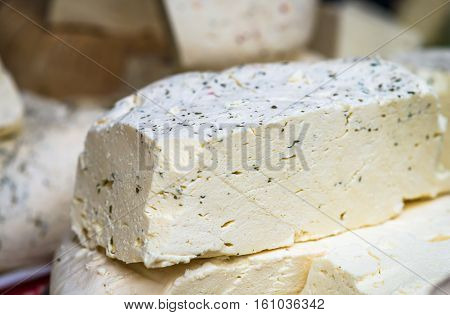 pieces of delicious white cheese with spices