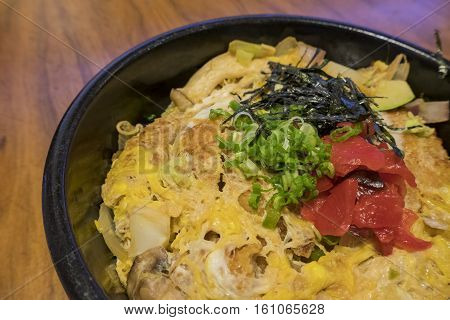 Delicious Japanese style Katsudon (Pork chop rice) in a bowl