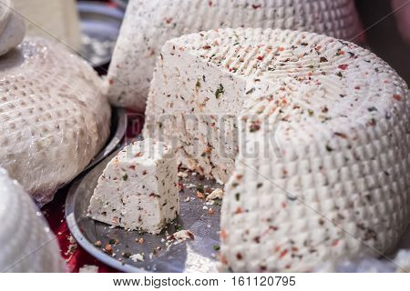 pieces of delicious white cheese with spices