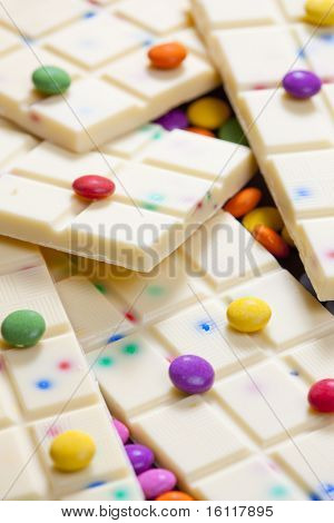 still life of white chocolate with smarties