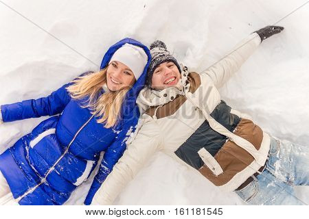The Guy And The Girl Have A Rest In The Winter Woods.