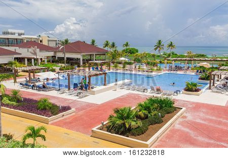 Cayo Guillermo island, Iberostar Playa Pilar hotel, Cuba, June 28, 2016, nice beautiful inviting view of big, wide open comfortable swimming pool with people relaxing and enjoying their time