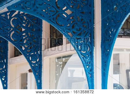 Blue decorative details on a kiosk on the pier at Llandudno Gwynedd Wales.