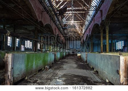Abandoned stabling for cattle in German slaughterhouse Rosenau