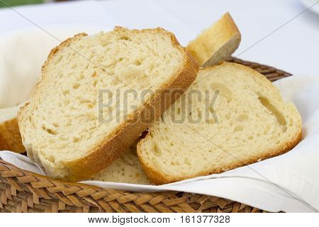 Bread In Basket. Slices Roll Breads In Basket On Table