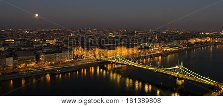 The lights of Budapest, the moon and the Danube
