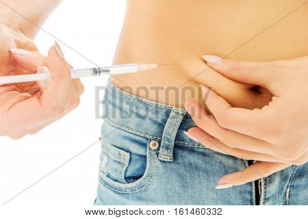 Woman diabetic does herself insulin injection
