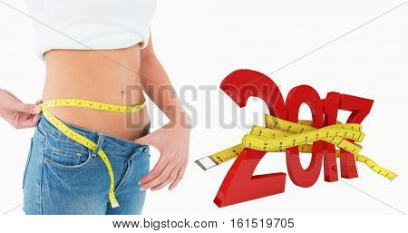 3D Mid section of a woman measuring waist in a big sized jeans against new year with tape measure