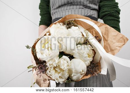 fresh bright blooming peonies flowers on white background. white and pink bud.