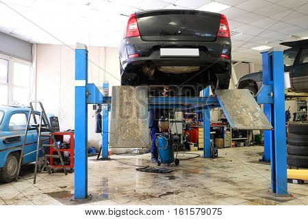 Car in a car repair station