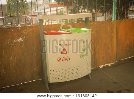 trash can or box with organic and non-organic on pondok cina station photo taken in jakarta indonesia