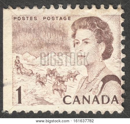 MOSCOW RUSSIA - CIRCA NOVEMBER 2016: a post stamp printed in CANADA shows a portrait of Queen Elizabeth II the series "The 100th Anniversary Celebration" circa 1967