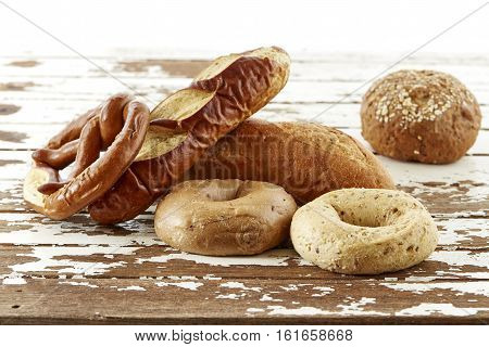 tasty assorted breads on the table wooden