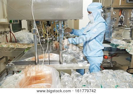 Pharmaceutical industry. physiological solution production. worker operating machine