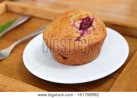 bluberry cupcake on the wood plate in thailand