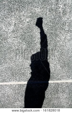 the shadow of the boy on the wall which plays in the phone