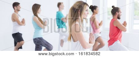 Smiling People In Yoga Class