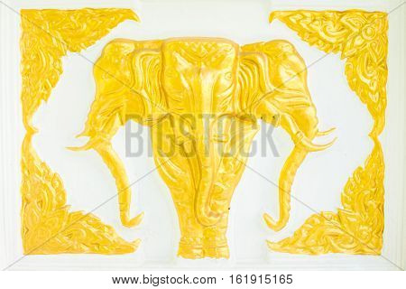 gold elephant three head on the wall