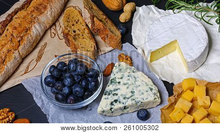 Cheese Platter On Tasting Plate With Different Cheeses - Camembert, Dorblu, Brie. Cheese On A Plate 