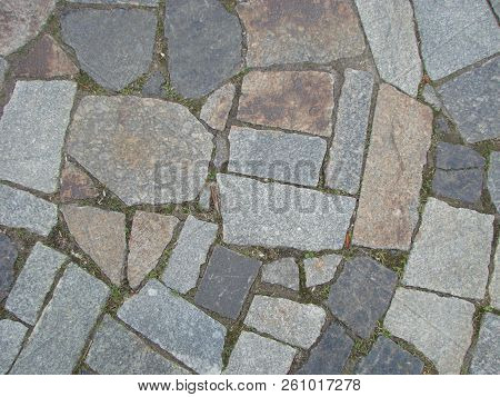 Stone Block Road Pavement As Texture. Background Wall Or Floor With Paving Stones. Rock Tile Wallpap