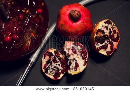 Hookah Hot Coals On Shisha Bowl With Black Background. Stylish Oriental Shisha. Garnet