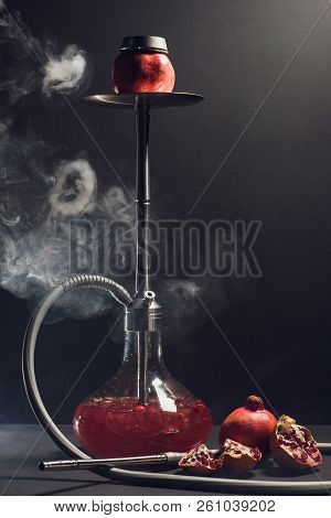 Hookah Hot Coals On Shisha Bowl With Black Background. Stylish Oriental Shisha. Garnet