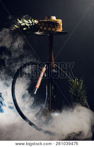 Hookah Hot Coals On Shisha Bowl With Black Background. Stylish Oriental Shisha. Pineapple