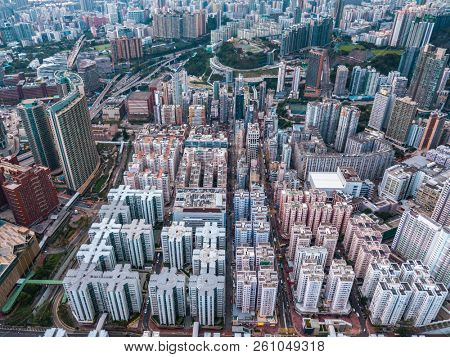 Top view aerial photo from flying drone of a HongKong Global City with development buildings, transportation, energy power infrastructure. Financial and business centers in developed China town