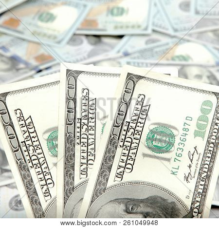 Old One Hundred Dollars Against The Background Of The New Ones