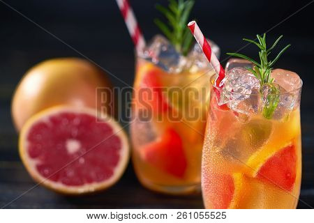 Close-uprefreshing Cocktail With Fresh Grapefruit And Rosemary