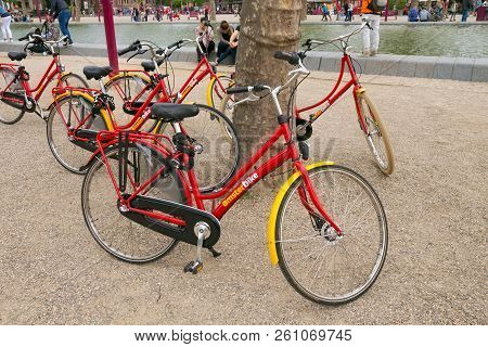Amsterdam, Netherlands - June 25, 2017: Parking With Bicycles For Rent Near The Rijksmuseum Dutch Na