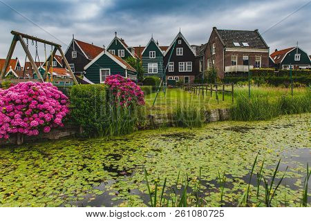 Beautiful Typical Fisherman Village Houses In Marken Island Waterland, The Netherlands In The Ijssel