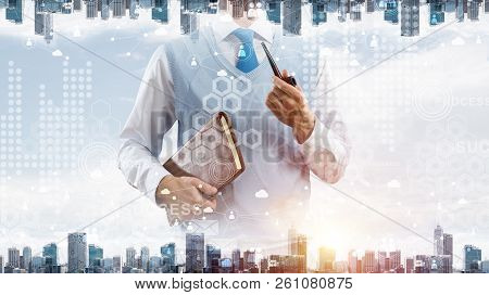 Double Exposure Of Confident And Young Businessman In Smart-casual Wear Smoking Pipe And Modern City